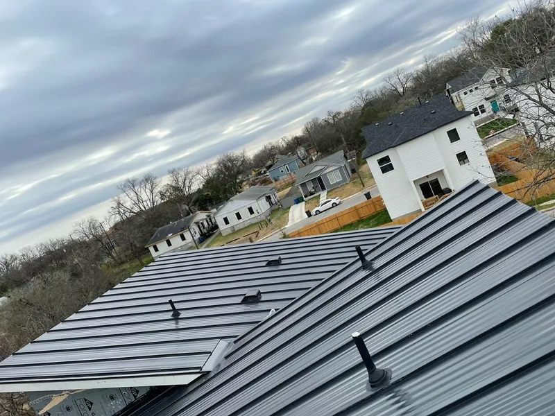 Standing seam metal roof panels with vents for Skylight Repair in Oak Park